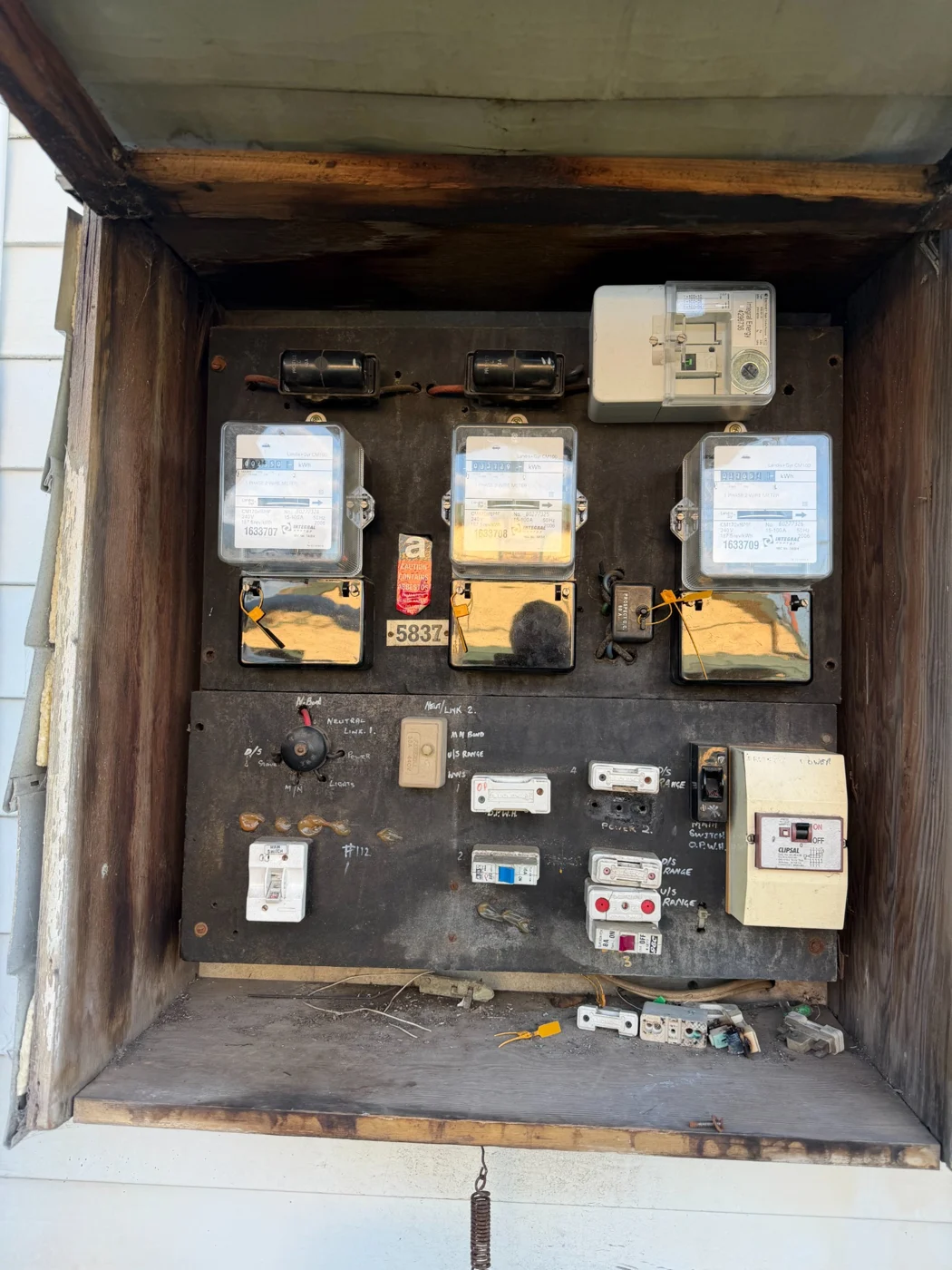 Toongabbie switchboard before the upgrade, with older meters and fuse equipment
